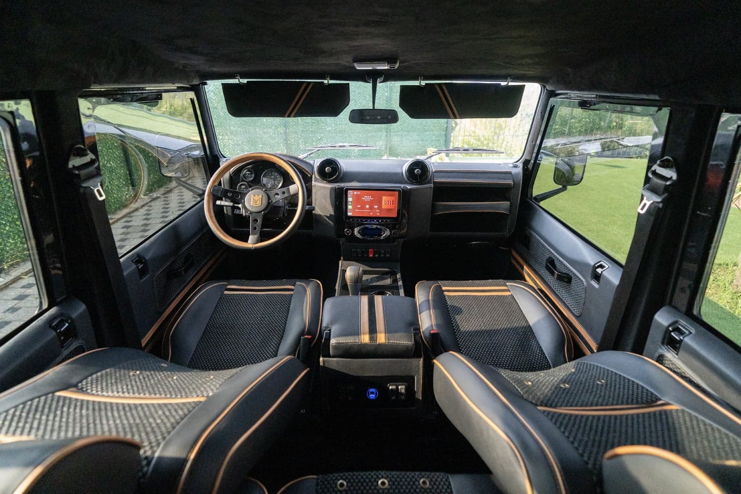Bespoke Land Rover Defender interior featuring premium materials and modern technology