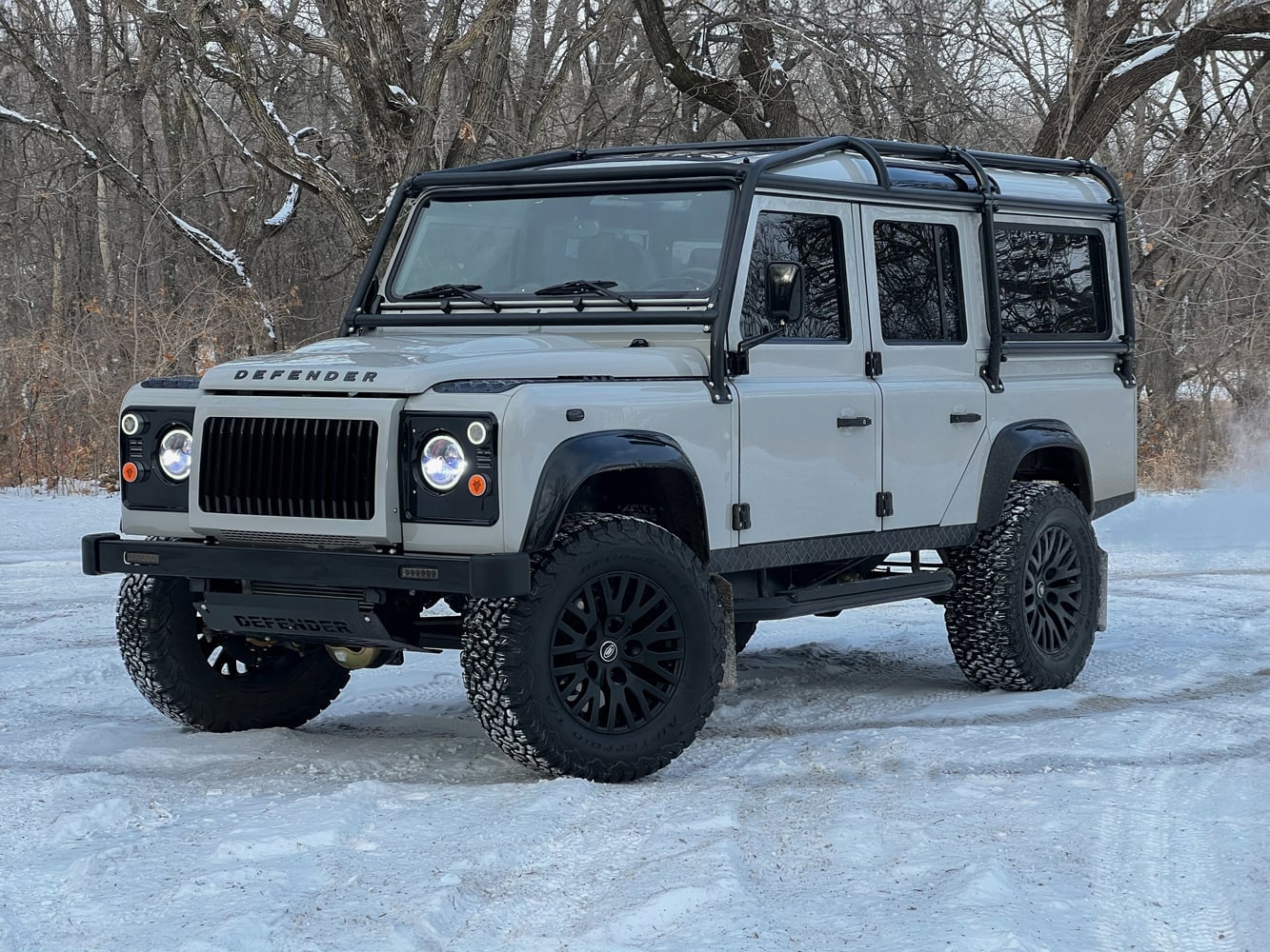Front View: Bespoke Land Rover Defender Custom Land Rover Defender in snowy landscape