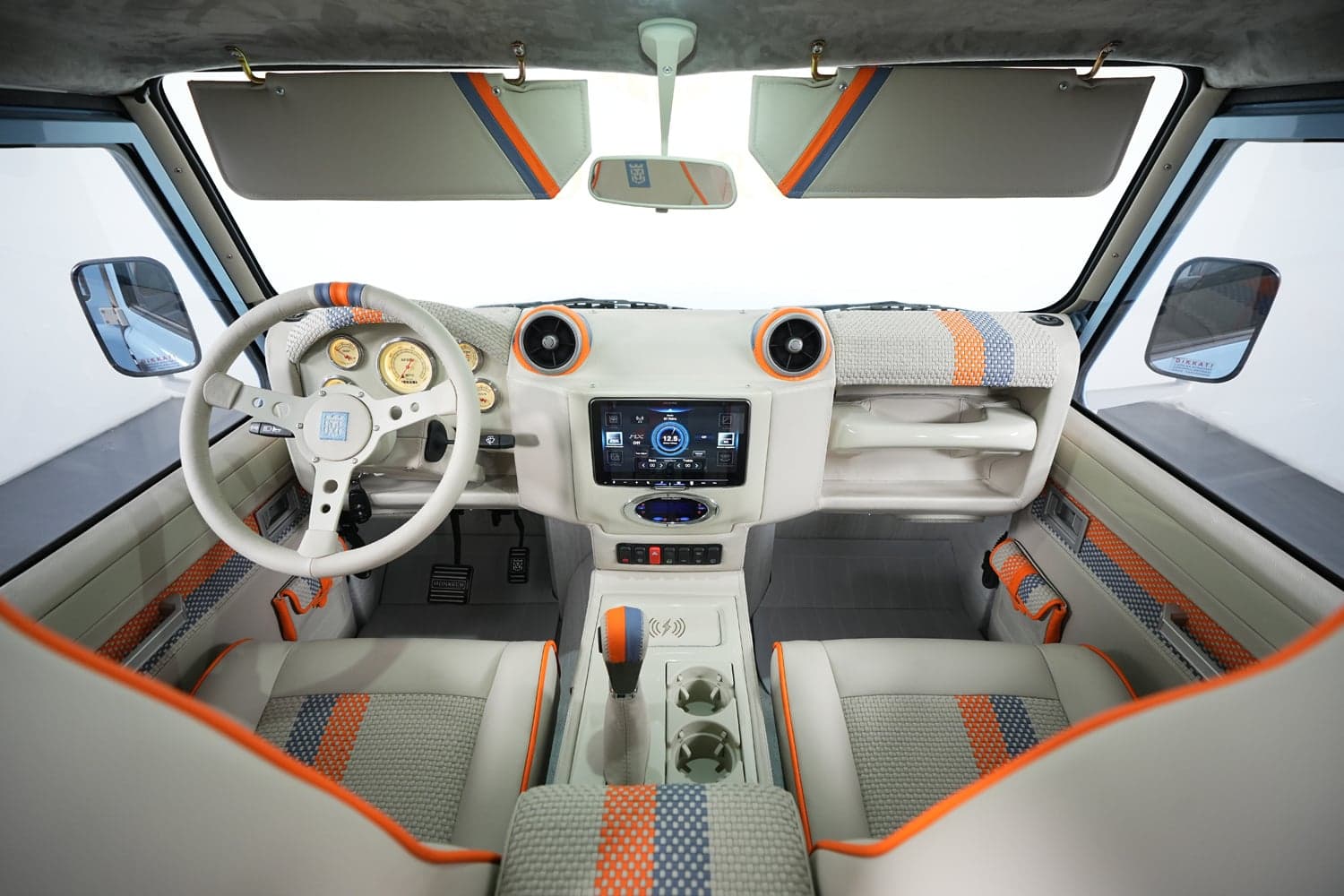 Interior Shot: Custom Luxury Cabin Bespoke Land Rover Defender interior featuring premium materials and modern technology