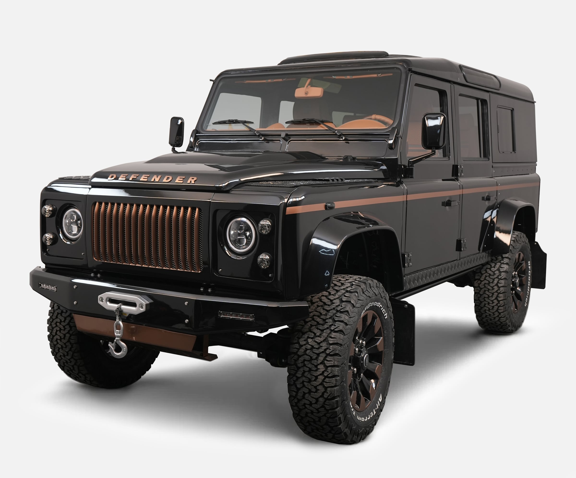 Front View: Bespoke Land Rover Defender Bespoke Land Rover Defender in black with copper accents
