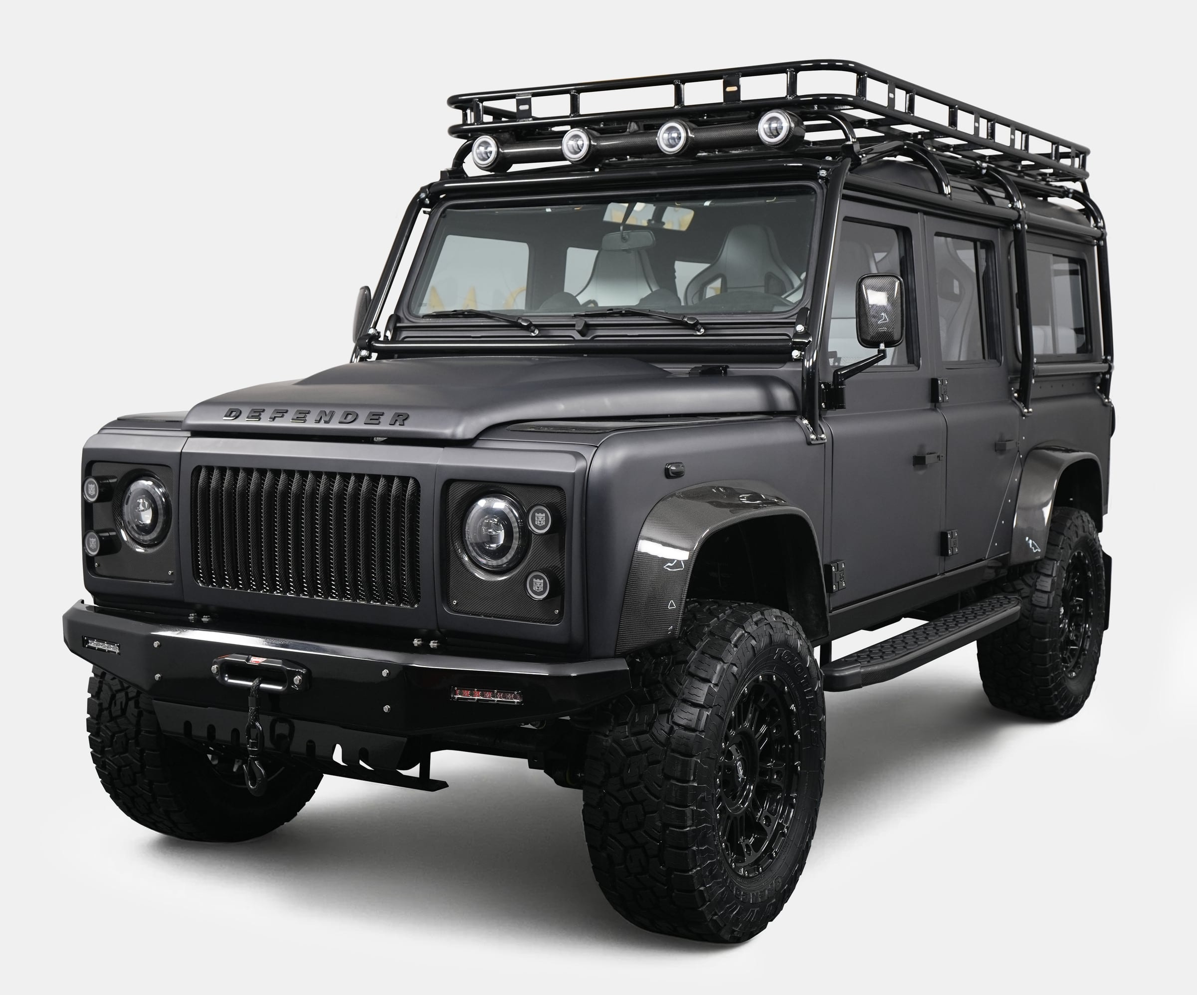 Bespoke Land Rover Defender in matte black with off-road features Bespoke Land Rover Defender in matte black with off-road features