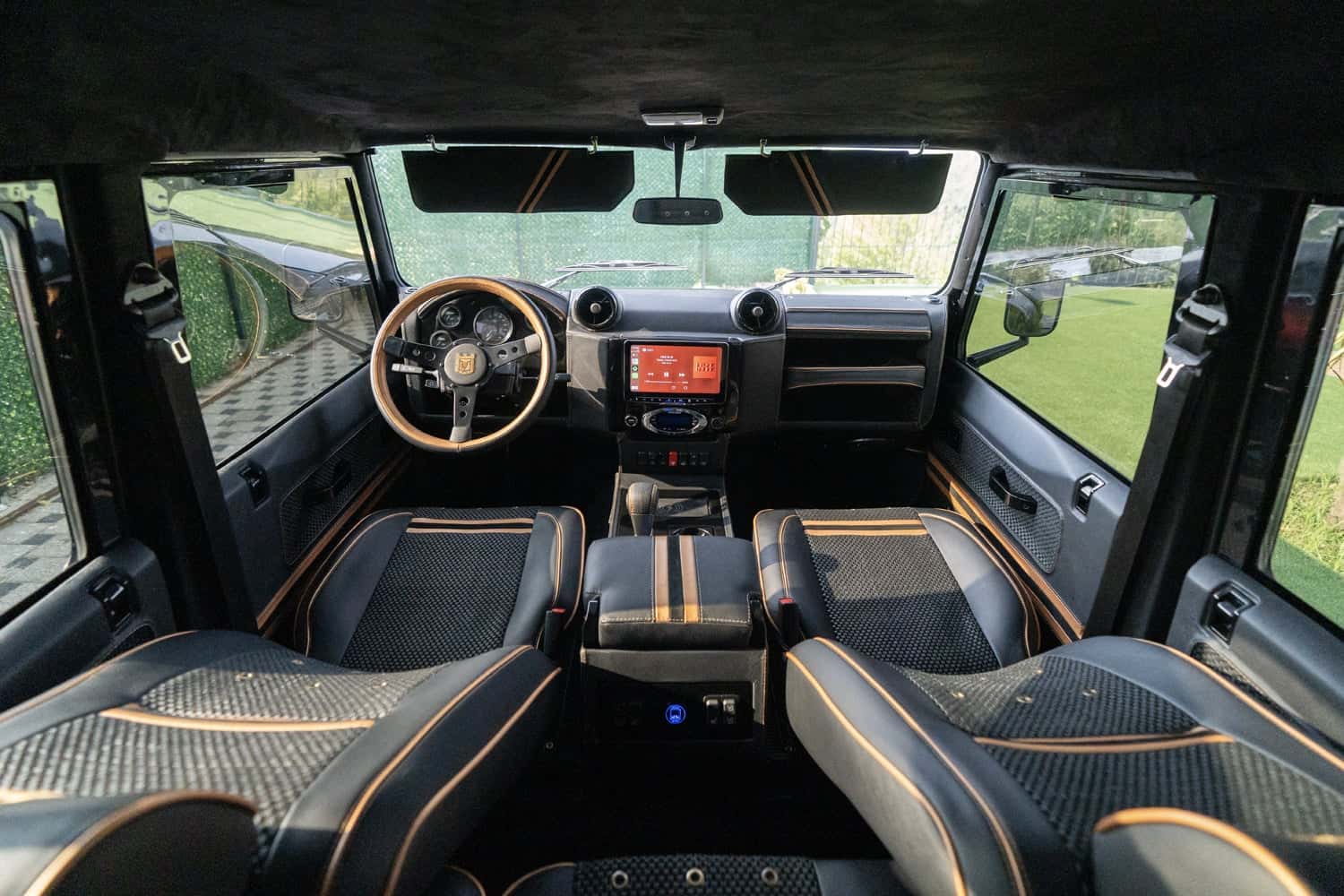 Bespoke Land Rover Defender interior featuring premium materials and modern technology