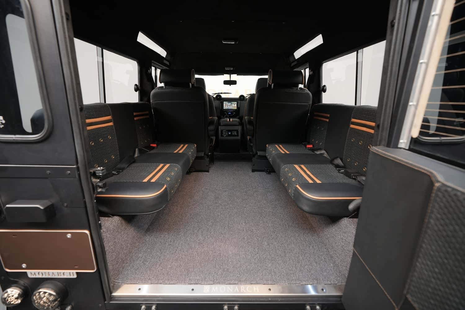 Luxurious interior of a custom Land Rover Defender with premium seating and modern design