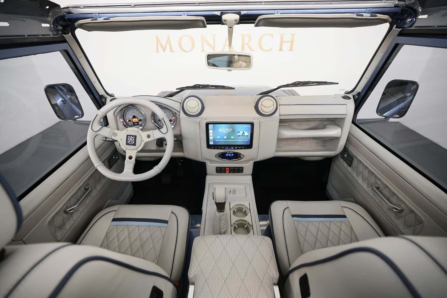 Bespoke Land Rover Defender interior featuring premium leather and modern technology