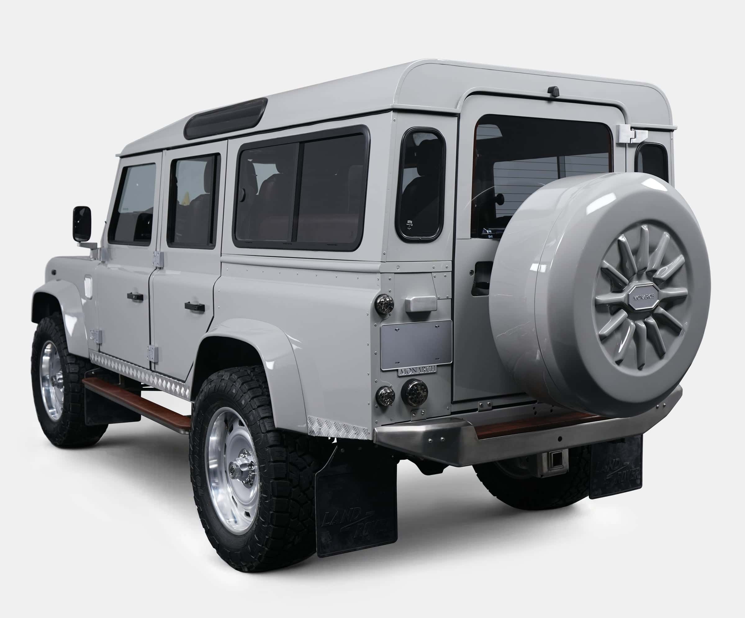 Custom Land Rover Defender in sleek gray with distinctive design features