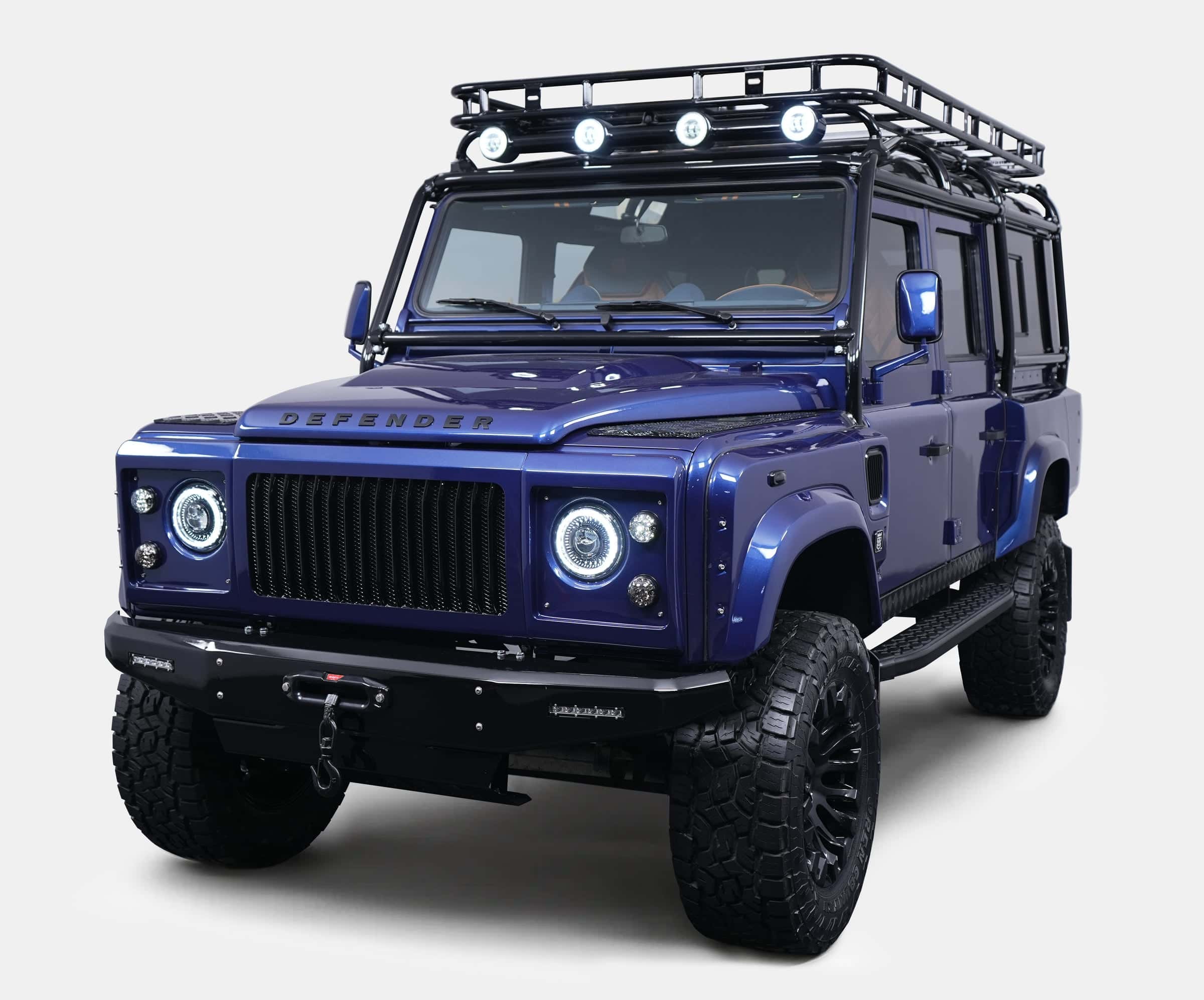 Custom Land Rover Defender in striking blue with off-road features