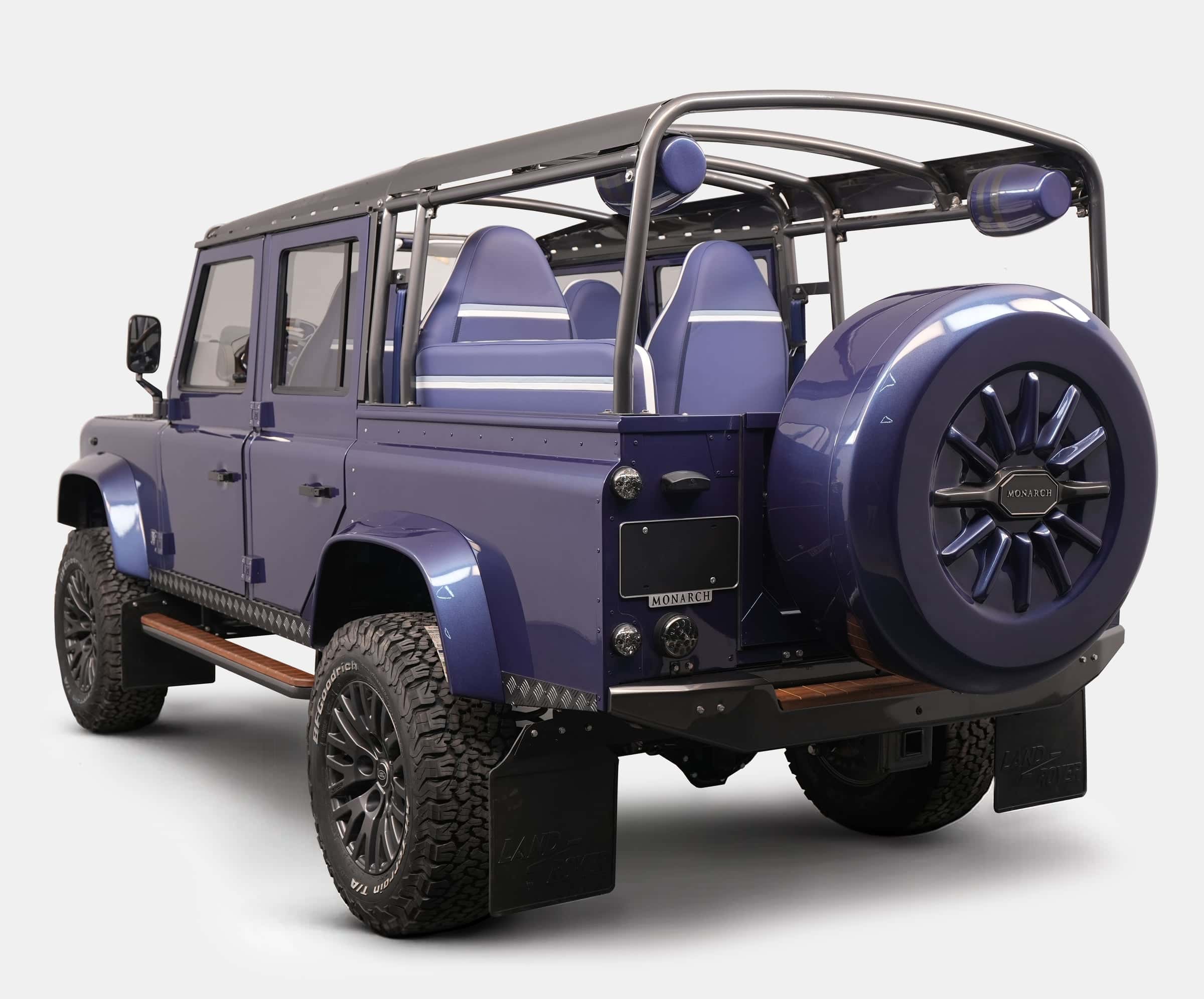 Bespoke Land Rover Defender in deep blue with custom seating and off-road tires