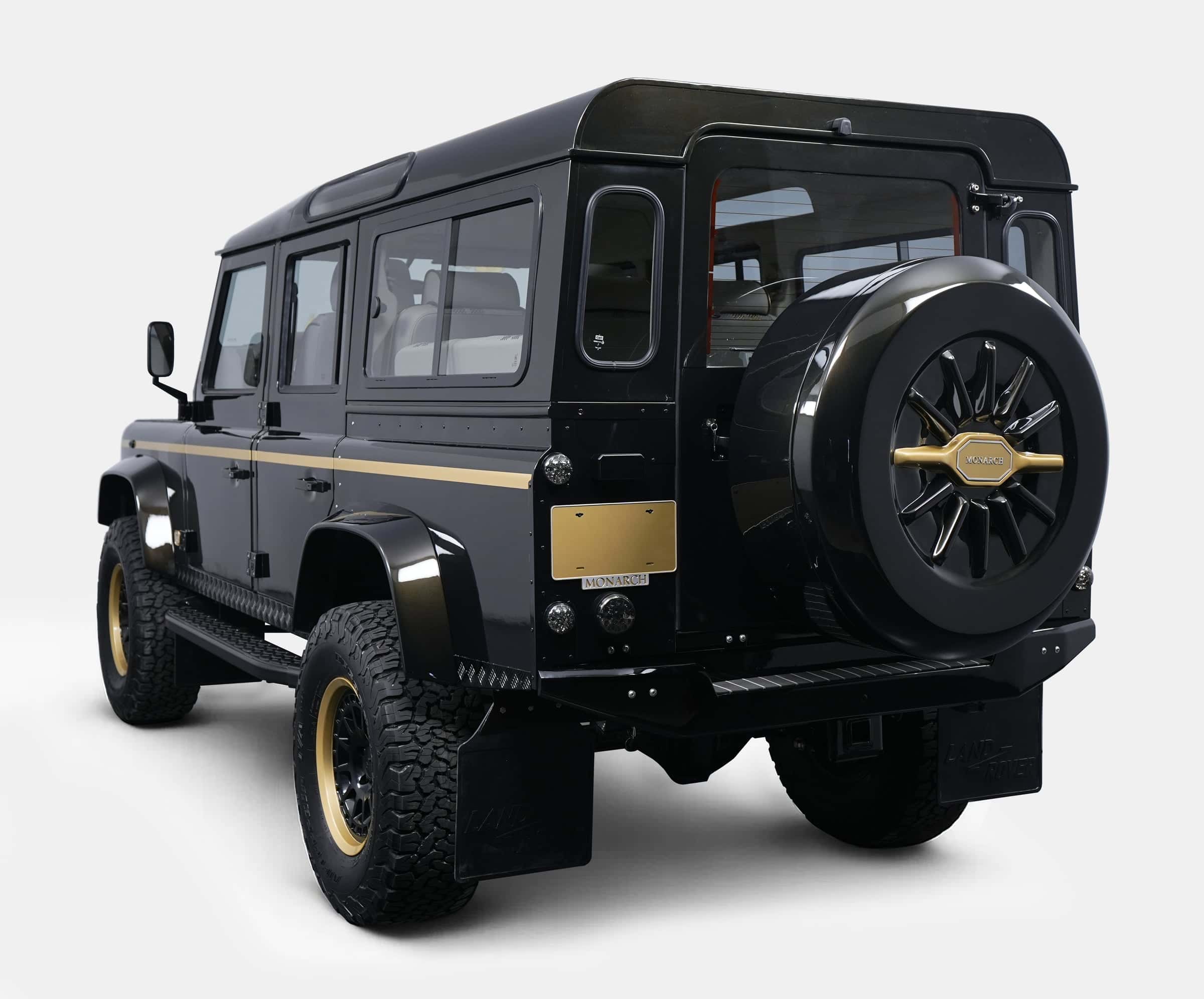 Bespoke Land Rover Defender in black with gold accents