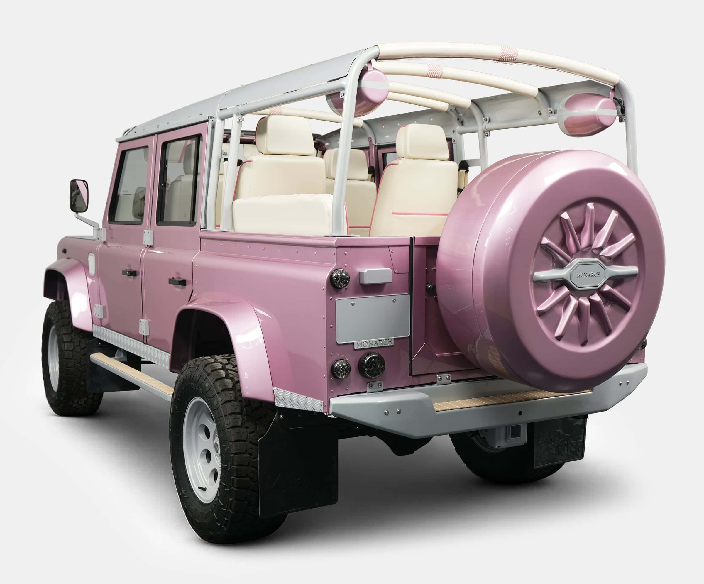 Custom pink Land Rover Defender with luxury interior and unique styling