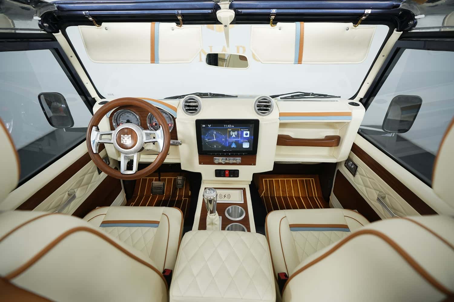 Bespoke Land Rover Defender interior featuring premium materials and modern technology