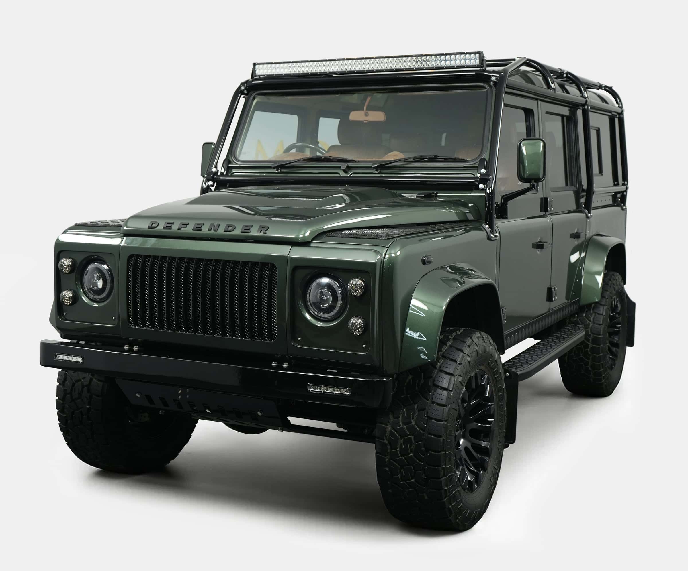 Custom Land Rover Defender in green with premium details