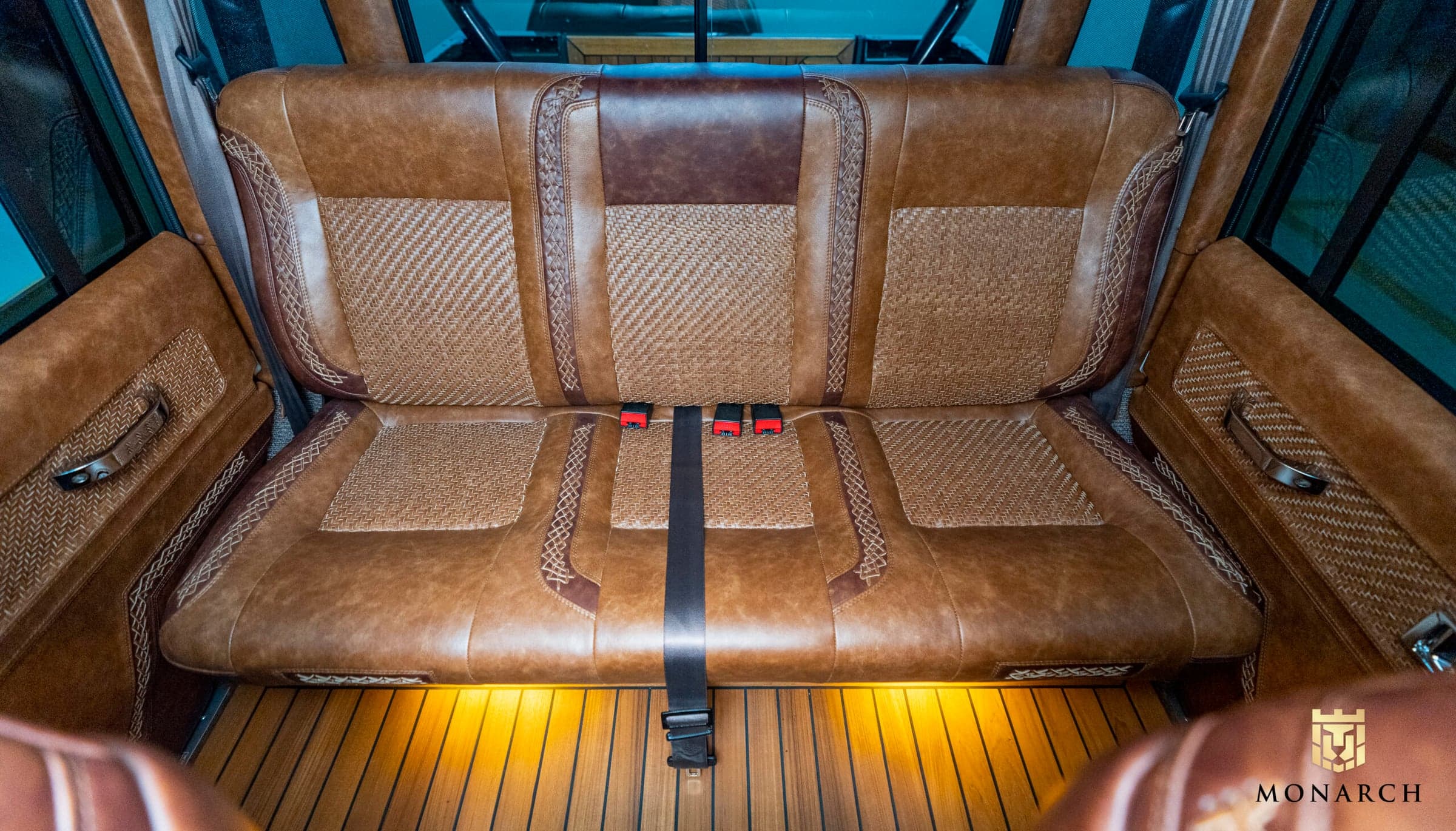 Bespoke leather seating in a custom Land Rover Defender with intricate detailing