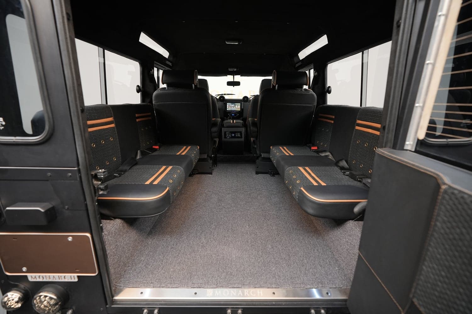 Luxurious interior of a custom Land Rover Defender with premium seating and modern design