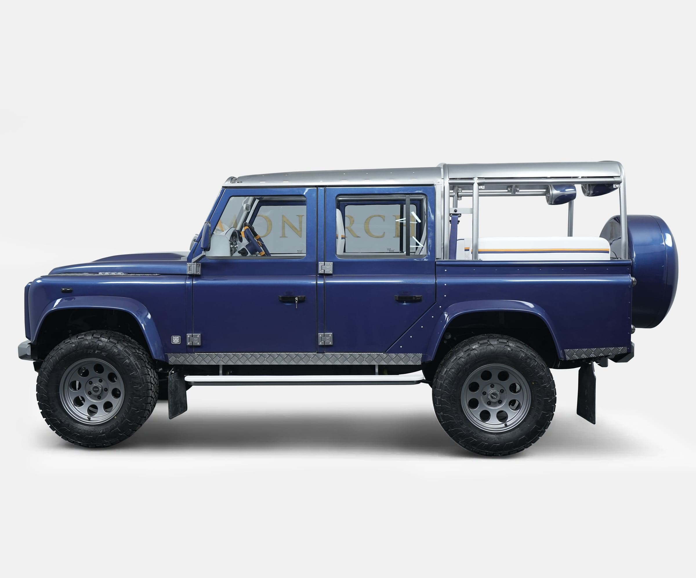 Custom Land Rover Defender in blue with unique design features