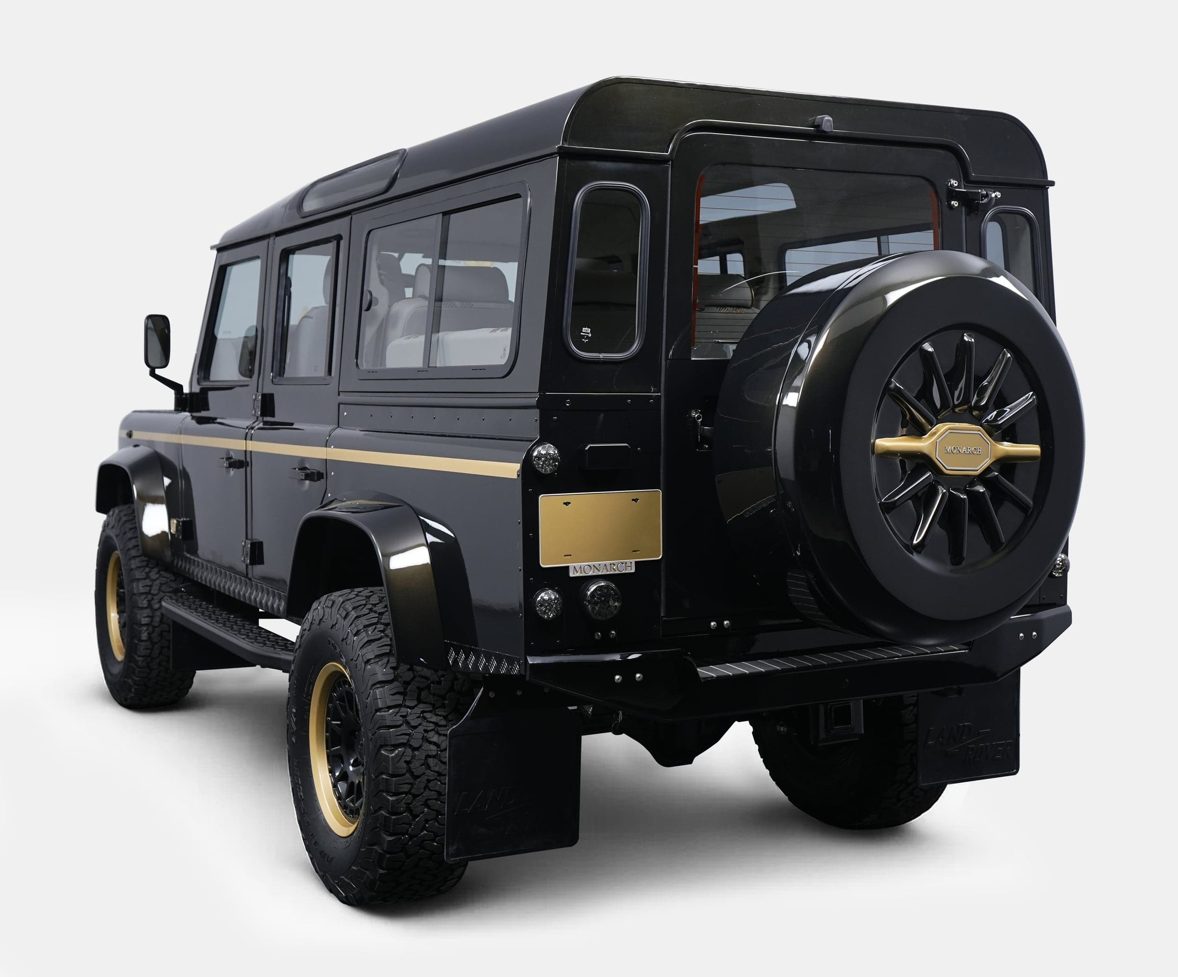 Bespoke Land Rover Defender in black with gold accents