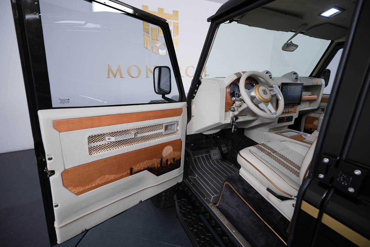Bespoke Land Rover Defender interior featuring custom leather and wood accents