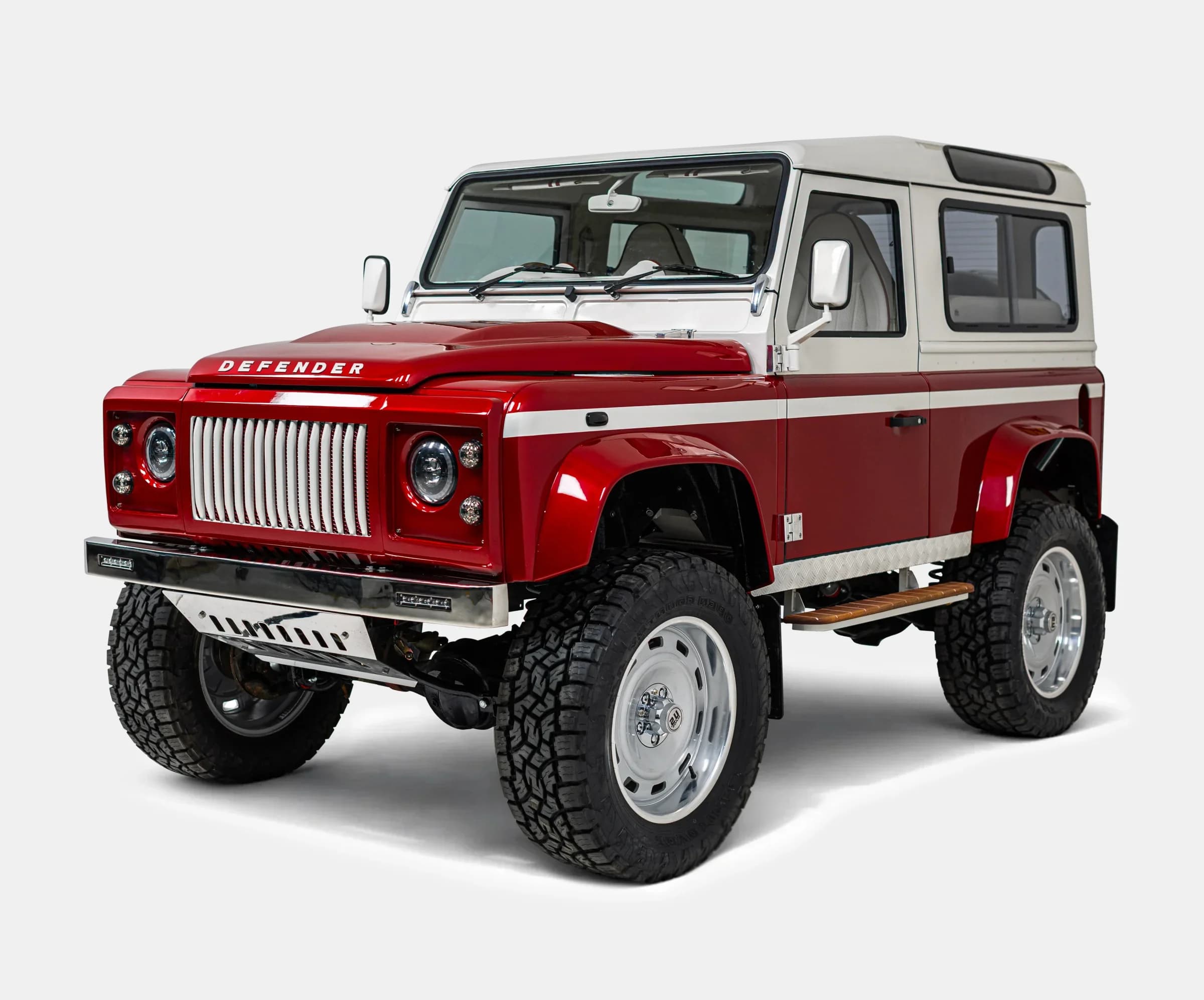 Finished Monarch Defender build in a custom paint color, showing the refined stance and period-correct details