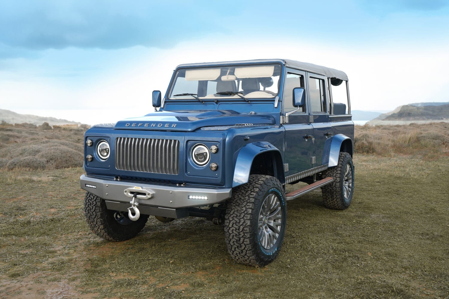 Custom blue Land Rover Defender with luxury design details