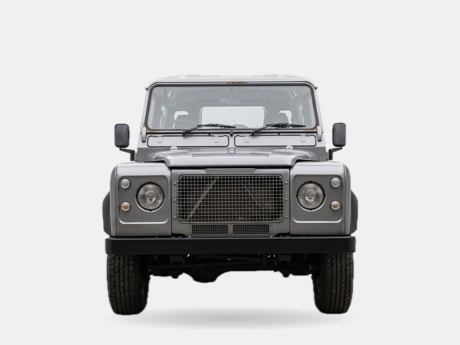 Typical restomod Defender with a fresh repaint
