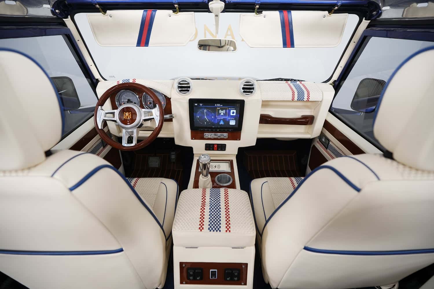 Interior Shot: Luxury Cabin Bespoke Land Rover Defender interior featuring premium materials and modern technology