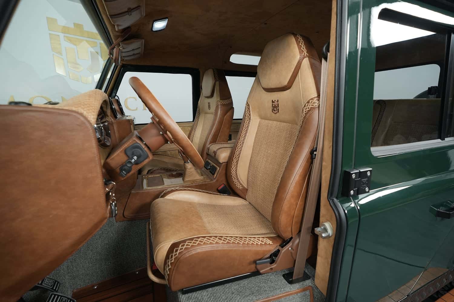 Interior Shot: Luxurious Cabin Design Custom Land Rover Defender interior featuring premium leather seats and detailed craftsmanship