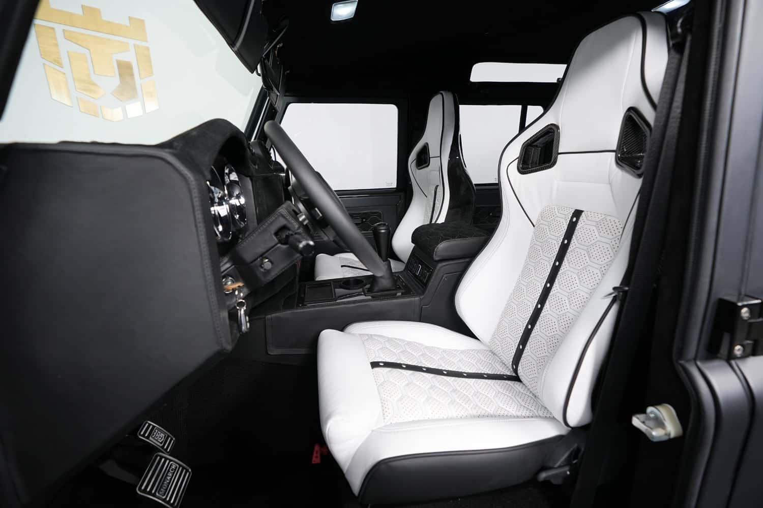 Interior Shot: Bespoke Seats Custom Land Rover Defender interior showcasing luxury seats