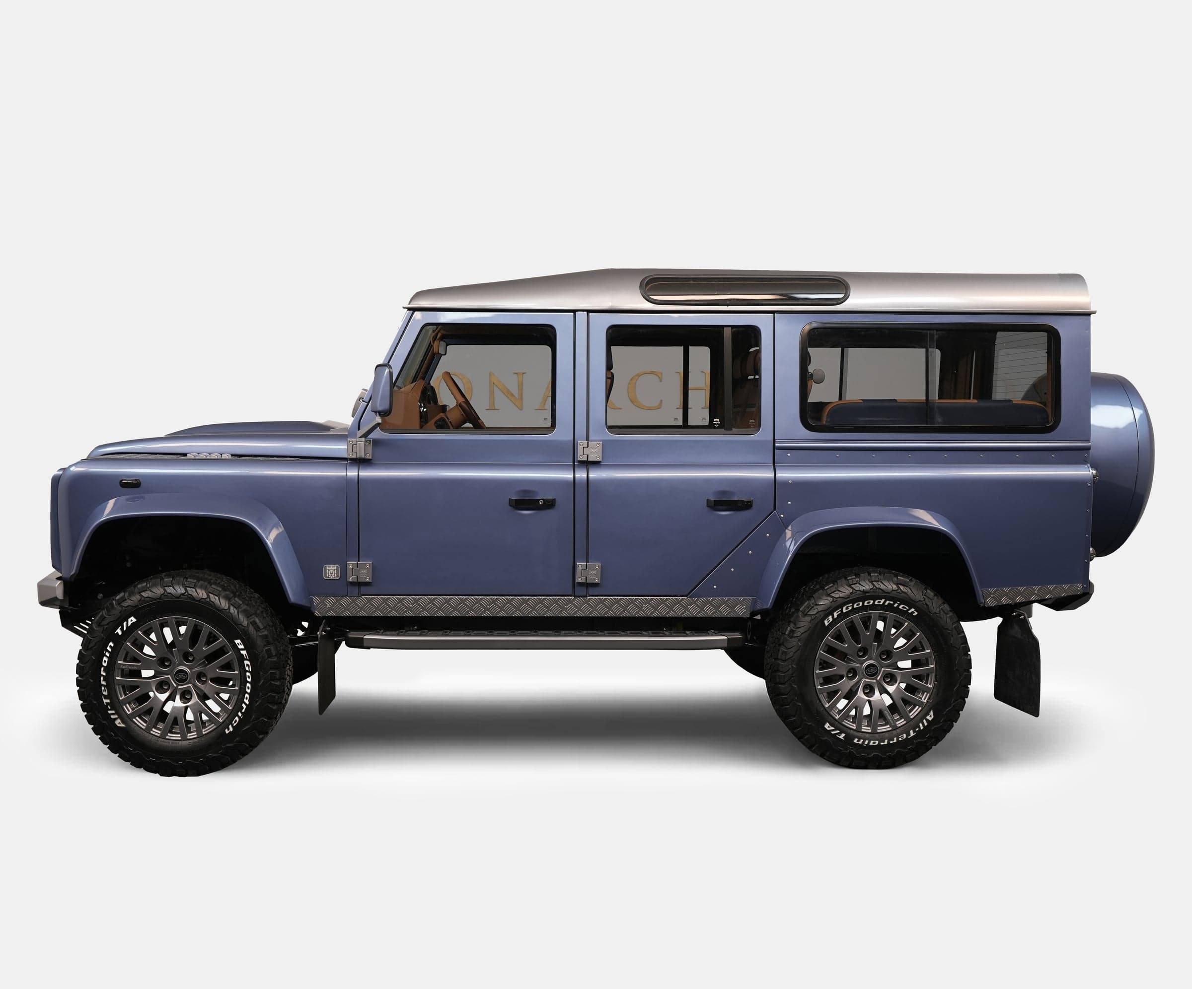 Side View: Bespoke Land Rover Defender Custom Land Rover Defender in blue with luxury details