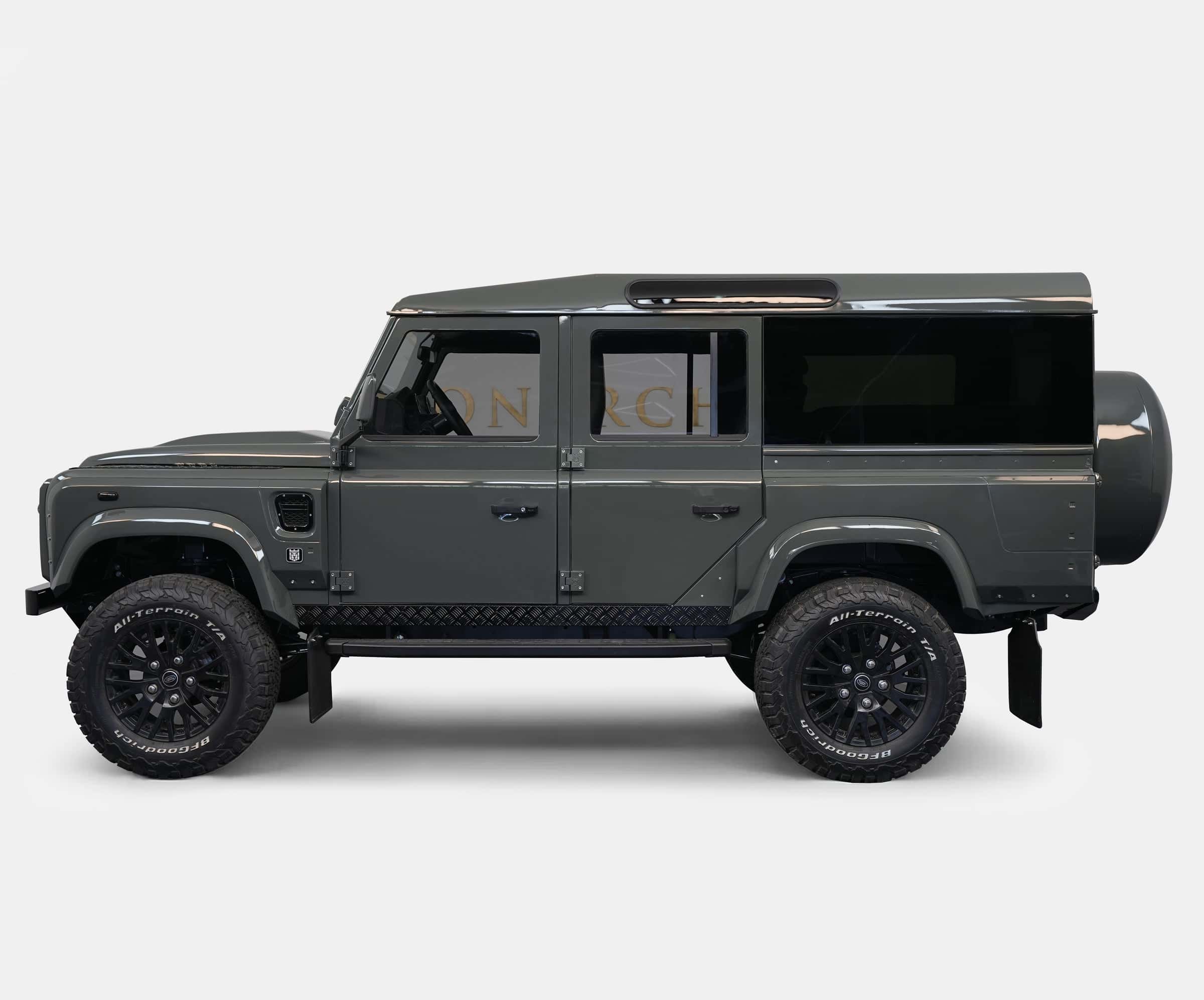 Side View: Bespoke Land Rover Defender Side view of a custom Land Rover Defender in a sleek gray finish