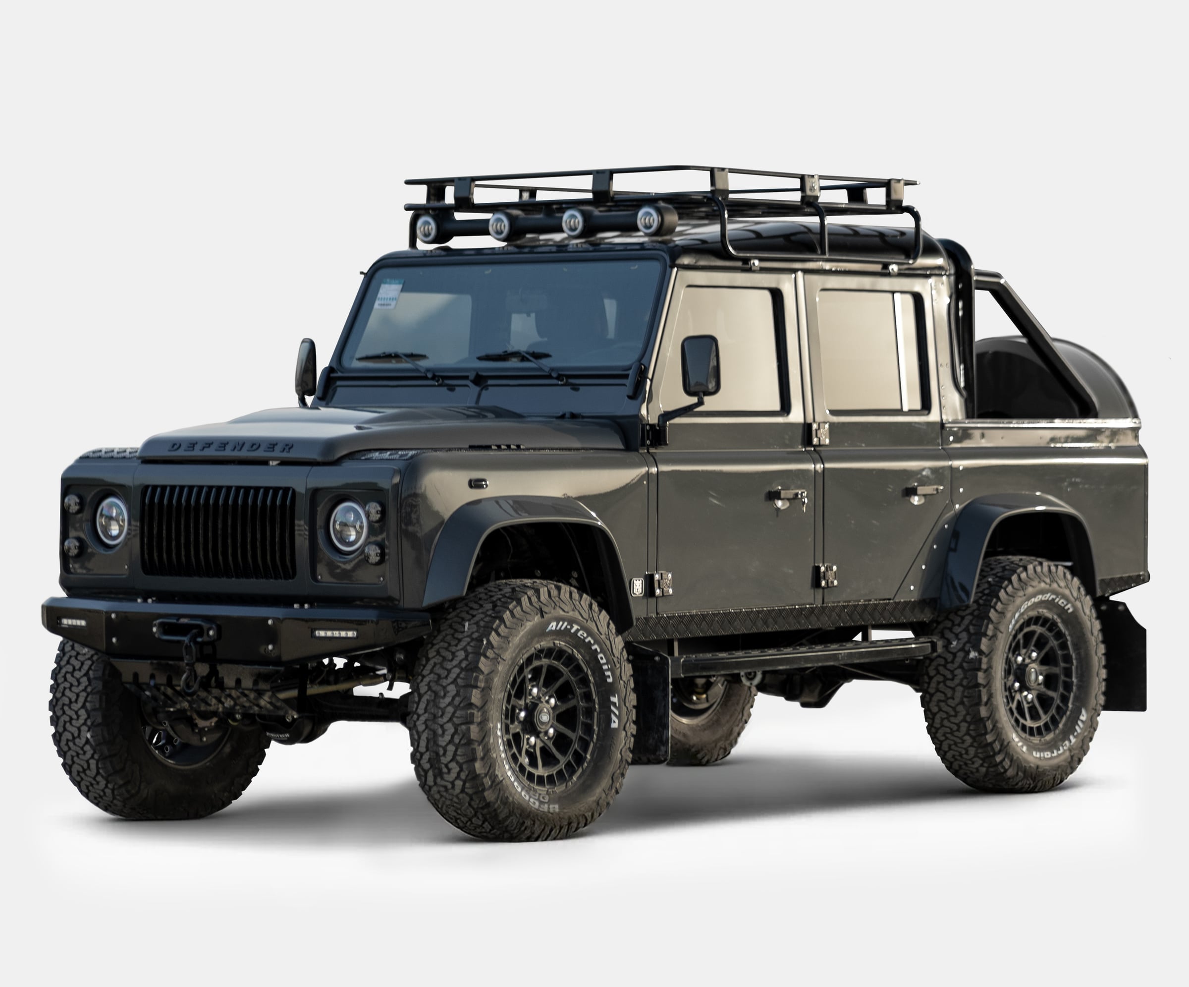 Luxury custom Land Rover Defender in sleek black finish with off-road capabilities Luxury custom Land Rover Defender in sleek black finish with off-road capabilities