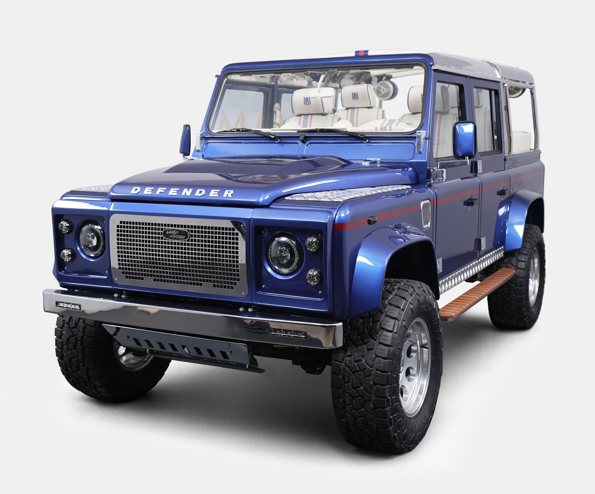 Front View: Bespoke Land Rover Defender Custom blue Land Rover Defender with luxury details and off-road capabilities