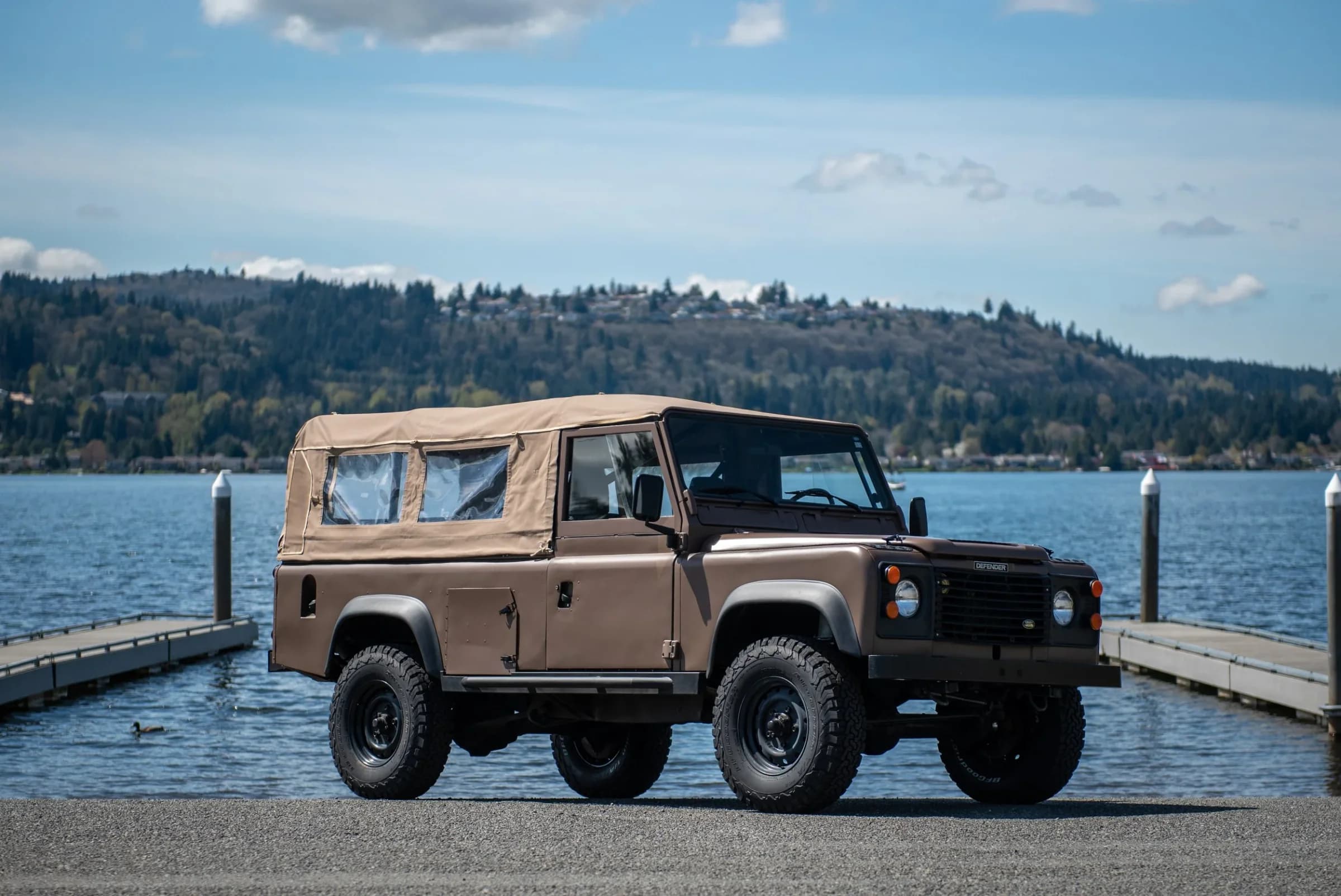 Vintage Land Rover Defender models showcasing their rugged legacy